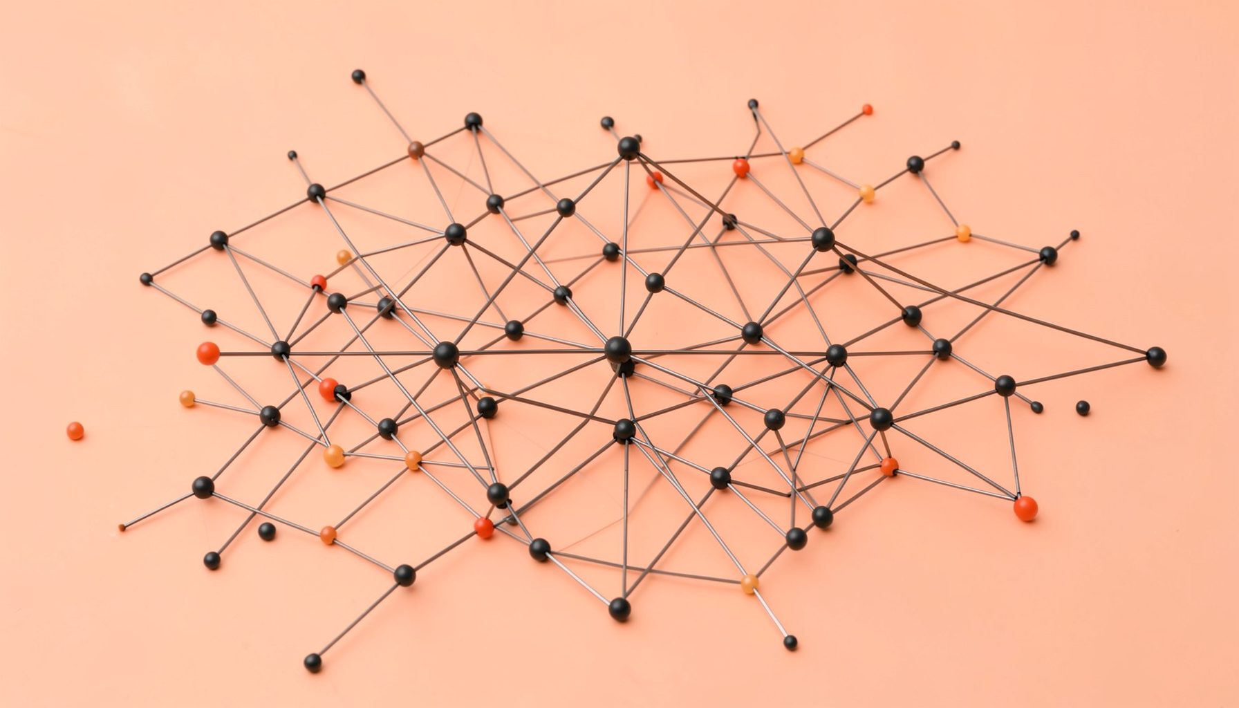 Abstract network of connected nodes in warm peach and charcoal tones, representing expert collaboration